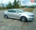 Серый Киа Оптима, объемом двигателя 2 л и пробегом 175 тыс. км за 9500 $, фото 3 на Automoto.ua