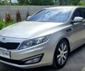Серый Киа Оптима, объемом двигателя 2 л и пробегом 320 тыс. км за 10700 $, фото 3 на Automoto.ua