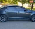 Сірий Кіа Оптіма, об'ємом двигуна 2 л та пробігом 215 тис. км за 10700 $, фото 5 на Automoto.ua