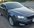 Сірий Кіа Оптіма, об'ємом двигуна 2.36 л та пробігом 210 тис. км за 7800 $, фото 2 на Automoto.ua