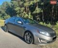 Серый Киа Оптима, объемом двигателя 2 л и пробегом 249 тыс. км за 9000 $, фото 1 на Automoto.ua