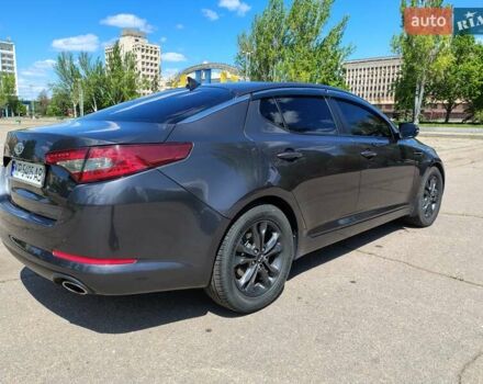 Сірий Кіа Оптіма, об'ємом двигуна 2 л та пробігом 200 тис. км за 10999 $, фото 1 на Automoto.ua