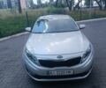 Серый Киа Оптима, объемом двигателя 2 л и пробегом 174 тыс. км за 10250 $, фото 2 на Automoto.ua