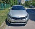 Серый Киа Оптима, объемом двигателя 2 л и пробегом 325 тыс. км за 8019 $, фото 1 на Automoto.ua