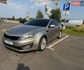 Сірий Кіа Оптіма, об'ємом двигуна 2.36 л та пробігом 161 тис. км за 9000 $, фото 1 на Automoto.ua