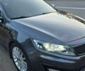 Сірий Кіа Оптіма, об'ємом двигуна 2.36 л та пробігом 210 тис. км за 7800 $, фото 1 на Automoto.ua
