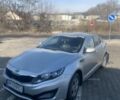 Сірий Кіа Оптіма, об'ємом двигуна 2 л та пробігом 283 тис. км за 5800 $, фото 1 на Automoto.ua