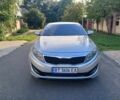Сірий Кіа Оптіма, об'ємом двигуна 2 л та пробігом 299 тис. км за 7023 $, фото 1 на Automoto.ua