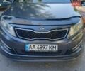 Серый Киа Оптима, объемом двигателя 2 л и пробегом 215 тыс. км за 9400 $, фото 2 на Automoto.ua
