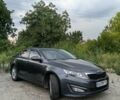 Сірий Кіа Оптіма, об'ємом двигуна 1.7 л та пробігом 300 тис. км за 11032 $, фото 1 на Automoto.ua