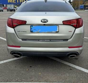 Сірий Кіа Оптіма, об'ємом двигуна 2.36 л та пробігом 112 тис. км за 9500 $, фото 1 на Automoto.ua