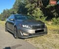 Серый Киа Оптима, объемом двигателя 2 л и пробегом 249 тыс. км за 9000 $, фото 1 на Automoto.ua