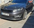 Сірий Кіа Оптіма, об'ємом двигуна 2 л та пробігом 215 тис. км за 10700 $, фото 1 на Automoto.ua