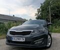 Сірий Кіа Оптіма, об'ємом двигуна 1.69 л та пробігом 180 тис. км за 11000 $, фото 3 на Automoto.ua