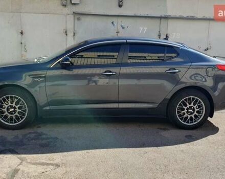 Серый Киа Оптима, объемом двигателя 2 л и пробегом 210 тыс. км за 12700 $, фото 2 на Automoto.ua