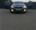 Серый Киа Оптима, объемом двигателя 2 л и пробегом 168 тыс. км за 9550 $, фото 2 на Automoto.ua