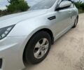 Серый Киа Оптима, объемом двигателя 2 л и пробегом 290 тыс. км за 6500 $, фото 4 на Automoto.ua