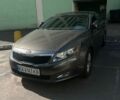 Серый Киа Оптима, объемом двигателя 2.36 л и пробегом 178 тыс. км за 9800 $, фото 1 на Automoto.ua