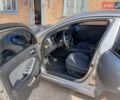 Серый Киа Оптима, объемом двигателя 2.4 л и пробегом 131 тыс. км за 9700 $, фото 2 на Automoto.ua