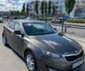Сірий Кіа Оптіма, об'ємом двигуна 2.36 л та пробігом 150 тис. км за 9300 $, фото 1 на Automoto.ua