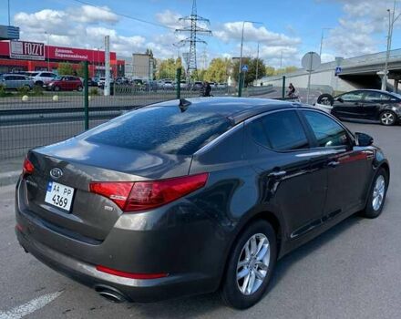 Серый Киа Оптима, объемом двигателя 2.36 л и пробегом 150 тыс. км за 9300 $, фото 2 на Automoto.ua