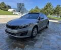 Серый Киа Оптима, объемом двигателя 2 л и пробегом 265 тыс. км за 10800 $, фото 2 на Automoto.ua
