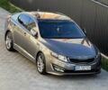 Серый Киа Оптима, объемом двигателя 2 л и пробегом 220 тыс. км за 10400 $, фото 1 на Automoto.ua