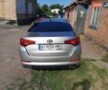 Серый Киа Оптима, объемом двигателя 2.4 л и пробегом 131 тыс. км за 9700 $, фото 1 на Automoto.ua