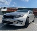 Серый Киа Оптима, объемом двигателя 2 л и пробегом 144 тыс. км за 10600 $, фото 3 на Automoto.ua