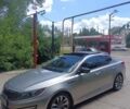 Сірий Кіа Оптіма, об'ємом двигуна 2 л та пробігом 156 тис. км за 10500 $, фото 1 на Automoto.ua