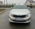 Серый Киа Оптима, объемом двигателя 2 л и пробегом 230 тыс. км за 8699 $, фото 1 на Automoto.ua