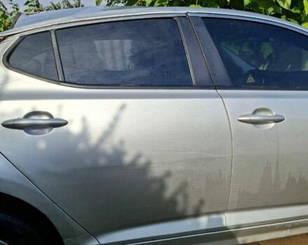 Серый Киа Оптима, объемом двигателя 2 л и пробегом 160 тыс. км за 3800 $, фото 2 на Automoto.ua