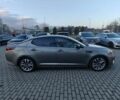 Серый Киа Оптима, объемом двигателя 2 л и пробегом 246 тыс. км за 13000 $, фото 2 на Automoto.ua