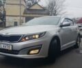 Серый Киа Оптима, объемом двигателя 2 л и пробегом 223 тыс. км за 10990 $, фото 1 на Automoto.ua