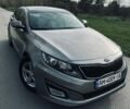 Сірий Кіа Оптіма, об'ємом двигуна 2.36 л та пробігом 190 тис. км за 9000 $, фото 1 на Automoto.ua