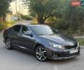 Сірий Кіа Оптіма, об'ємом двигуна 2 л та пробігом 170 тис. км за 10800 $, фото 2 на Automoto.ua