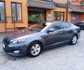 Сірий Кіа Оптіма, об'ємом двигуна 2.36 л та пробігом 230 тис. км за 7799 $, фото 9 на Automoto.ua