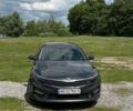 Серый Киа Оптима, объемом двигателя 2.36 л и пробегом 185 тыс. км за 12400 $, фото 1 на Automoto.ua