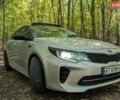 Сірий Кіа Оптіма, об'ємом двигуна 2.36 л та пробігом 156 тис. км за 11750 $, фото 1 на Automoto.ua