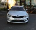 Сірий Кіа Оптіма, об'ємом двигуна 2 л та пробігом 170 тис. км за 10999 $, фото 1 на Automoto.ua