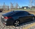 Серый Киа Оптима, объемом двигателя 2 л и пробегом 163 тыс. км за 12000 $, фото 5 на Automoto.ua