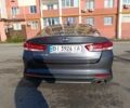 Серый Киа Оптима, объемом двигателя 2.4 л и пробегом 140 тыс. км за 10500 $, фото 3 на Automoto.ua