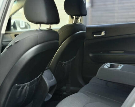 Сірий Кіа Оптіма, об'ємом двигуна 2.36 л та пробігом 192 тис. км за 9000 $, фото 4 на Automoto.ua