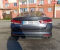 Серый Киа Оптима, объемом двигателя 2.36 л и пробегом 144 тыс. км за 10000 $, фото 7 на Automoto.ua