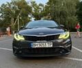 Серый Киа Оптима, объемом двигателя 2.36 л и пробегом 180 тыс. км за 15990 $, фото 2 на Automoto.ua