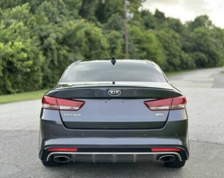 Серый Киа Оптима, объемом двигателя 2 л и пробегом 32 тыс. км за 9600 $, фото 5 на Automoto.ua
