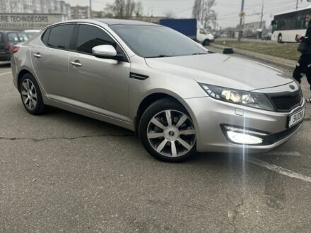 Серый Киа Оптима, объемом двигателя 2 л и пробегом 243 тыс. км за 10500 $, фото 1 на Automoto.ua