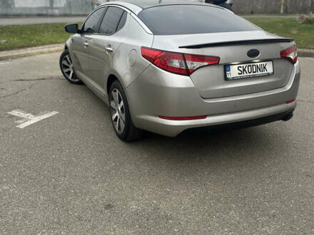 Сірий Кіа Оптіма, об'ємом двигуна 2 л та пробігом 245 тис. км за 10500 $, фото 1 на Automoto.ua