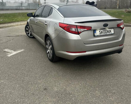 Серый Киа Оптима, объемом двигателя 2 л и пробегом 245 тыс. км за 10500 $, фото 1 на Automoto.ua