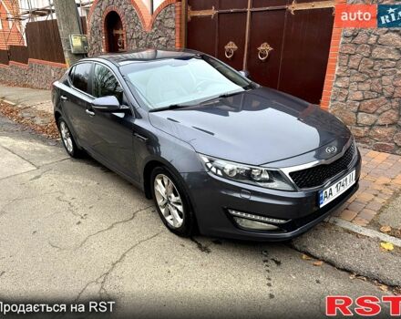 Серый Киа Оптима, объемом двигателя 2 л и пробегом 211 тыс. км за 10000 $, фото 1 на Automoto.ua